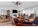 Bright living room with hardwood floors and comfortable furniture at 3407 Palometa Dr, Hernando Beach, FL 34607