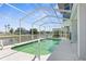 Relaxing screened pool area with canal views at 3407 Palometa Dr, Hernando Beach, FL 34607