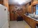 View of kitchen with wood cabinets and copper cookware at 34582 Orchid Pkwy, Dade City, FL 33523