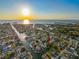 Waterfront property aerial view at sunset at 13912 Sommers Ave, Hudson, FL 34667