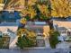 An aerial view showcasing the home's location by the water at 13912 Sommers Ave, Hudson, FL 34667