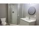 Updated bathroom with a shower and vanity at 13912 Sommers Ave, Hudson, FL 34667