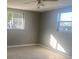 Spacious bedroom with neutral walls and new carpet at 13912 Sommers Ave, Hudson, FL 34667
