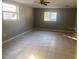 Bedroom with tile flooring and neutral decor at 13912 Sommers Ave, Hudson, FL 34667