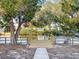 Wooden dock with boardwalk access overlooking a calm waterway at 13912 Sommers Ave, Hudson, FL 34667