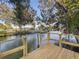 Wooden deck overlooking a peaceful canal at 13912 Sommers Ave, Hudson, FL 34667