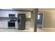 Modern kitchen with stainless steel appliances at 13912 Sommers Ave, Hudson, FL 34667