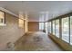 Spacious screened porch overlooking backyard at 13912 Sommers Ave, Hudson, FL 34667