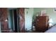 Bedroom with a dresser and barn doors at 8210 Aquila St # 226, Port Richey, FL 34668