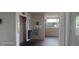 Condo building hallway with elevator, mailboxes, and notice board at 8210 Aquila St # 226, Port Richey, FL 34668