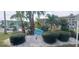 Community clubhouse entrance with landscaping at 8210 Aquila St # 226, Port Richey, FL 34668