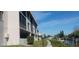 Building exterior showcasing waterfront canal views and boat docks at 8210 Aquila St # 226, Port Richey, FL 34668
