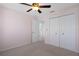 Spacious bedroom with double-door closet and neutral walls at 3480 Croaker Dr, Hernando Beach, FL 34607