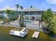 Two-story house with a private pool, dock, and canal access at 3480 Croaker Dr, Hernando Beach, FL 34607