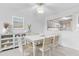 Charming dining room featuring a beachy aesthetic and lots of natural light at 5537 Sea Forest Dr # 307, New Port Richey, FL 34652