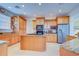 Spacious kitchen with center island and granite countertops at 7352 Gulf Way, Hudson, FL 34667