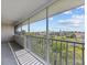 Screened balcony with view of neighborhood and waterway at 5537 Sea Forest Dr # 307, New Port Richey, FL 34652