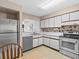 Kitchen with stainless steel appliances and ample cabinet space at 5537 Sea Forest Dr # 307, New Port Richey, FL 34652