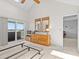 Spacious bedroom with balcony access and built-in dresser at 5537 Sea Forest Dr # 307, New Port Richey, FL 34652