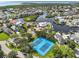 Aerial view showcasing community tennis courts at 5537 Sea Forest Dr # 307, New Port Richey, FL 34652