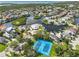 Aerial view of waterfront community with tennis courts at 5537 Sea Forest Dr # 307, New Port Richey, FL 34652