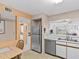Bright kitchen features stainless steel appliances and an eat-in area at 5537 Sea Forest Dr # 307, New Port Richey, FL 34652
