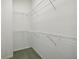 Walk-in closet with wire shelving providing ample storage space at 329 Sunset Way, Palm Harbor, FL 34683