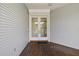 Exterior entrance with double doors and wooden deck at 329 Sunset Way, Palm Harbor, FL 34683
