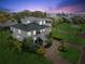 Aerial nighttime view of house and waterfront at 329 Sunset Way, Palm Harbor, FL 34683