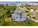 Aerial view of house showing roof, landscaping and location at 329 Sunset Way, Palm Harbor, FL 34683