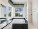 Bathroom with a large soaking tub, shower, and window views at 329 Sunset Way, Palm Harbor, FL 34683