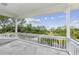 Spacious balcony offering scenic water views and neighborhood views at 329 Sunset Way, Palm Harbor, FL 34683