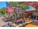 The Ozona Pig Southern Style BBQ restaurant features outdoor seating and a charming atmosphere at 329 Sunset Way, Palm Harbor, FL 34683