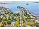 Wide aerial showcasing house location on waterfront at 329 Sunset Way, Palm Harbor, FL 34683