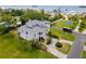 Aerial view of house, driveway, and surrounding area at 329 Sunset Way, Palm Harbor, FL 34683