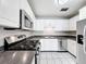 Bright kitchen with stainless steel appliances and sleek countertops at 1513 55Th N Ave, St Petersburg, FL 33703