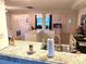 Spacious kitchen with granite countertops and an island with breakfast bar seating at 5144 Chime Way, Holiday, FL 34690