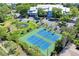 Two well-maintained tennis courts in a condo community at 2511 Dolly Bay Dr # 308, Palm Harbor, FL 34684