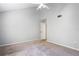 Simple bedroom with carpeted floor and neutral walls at 2511 Dolly Bay Dr # 308, Palm Harbor, FL 34684