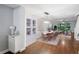 Bright dining area with hardwood floors and modern light fixture at 2511 Dolly Bay Dr # 308, Palm Harbor, FL 34684