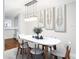 Dining room with table, chairs, and stylish wall art at 2511 Dolly Bay Dr # 308, Palm Harbor, FL 34684