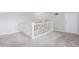 Upstairs landing with carpeted floor and staircase at 2511 Dolly Bay Dr # 308, Palm Harbor, FL 34684