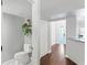 Clean and updated bathroom with white toilet and shelving at 2511 Dolly Bay Dr # 308, Palm Harbor, FL 34684