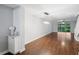 Spacious living room with hardwood floors and sliding doors to balcony at 2511 Dolly Bay Dr # 308, Palm Harbor, FL 34684