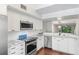 Modern kitchen with stainless steel appliances and marble countertops at 2511 Dolly Bay Dr # 308, Palm Harbor, FL 34684