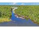 Aerial view of community, boat docks, and waterfront access at 2511 Dolly Bay Dr # 308, Palm Harbor, FL 34684