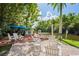 Relaxing waterfront dock with seating and picnic tables at 2511 Dolly Bay Dr # 308, Palm Harbor, FL 34684