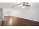 Large living room with hardwood floors and ceiling fan at 2511 Dolly Bay Dr # 308, Palm Harbor, FL 34684