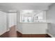 Modern kitchen with white cabinets and marble countertops at 2511 Dolly Bay Dr # 308, Palm Harbor, FL 34684