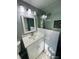 Updated bathroom with white vanity and glass shower at 2013 Finland Dr, Spring Hill, FL 34609